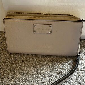 Kate Spade Cream Wristlet with Gold Accents